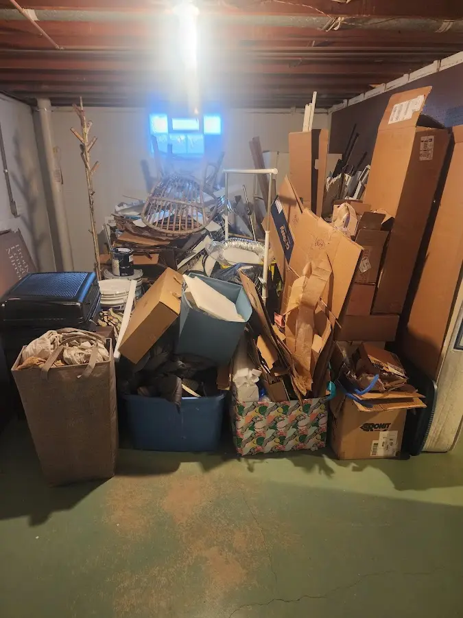 Roll-off dumpster container at job site for 2 Yard Dumpster Rental in Littleton